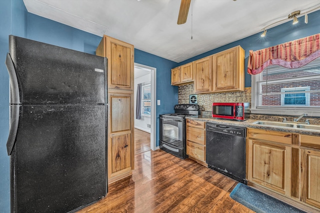 kitchen featuring black appliances, sink, dark hardwood / wood-style floors, ceiling fan, and tasteful backsplash