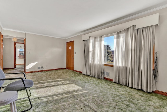 interior space with carpet and ornamental molding