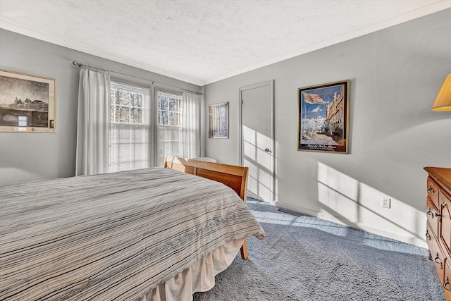 bedroom with light colored carpet, a textured ceiling, and ornamental molding