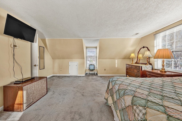 bedroom with carpet flooring, baseboards, visible vents, a textured ceiling, and lofted ceiling
