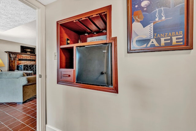 interior details with a textured ceiling