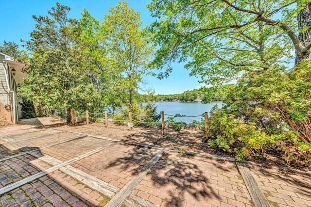 view of patio / terrace with a water view