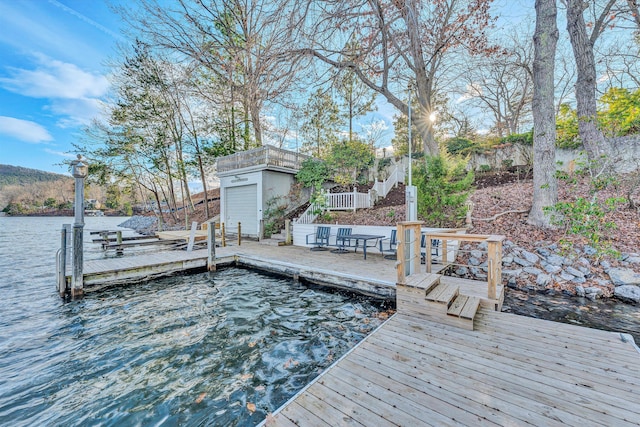 view of dock with a water view