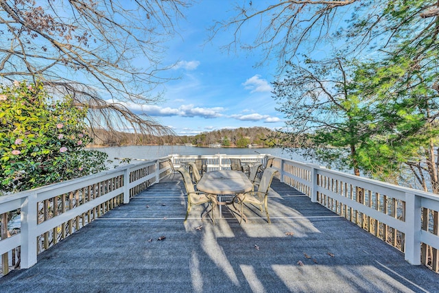 deck featuring a water view