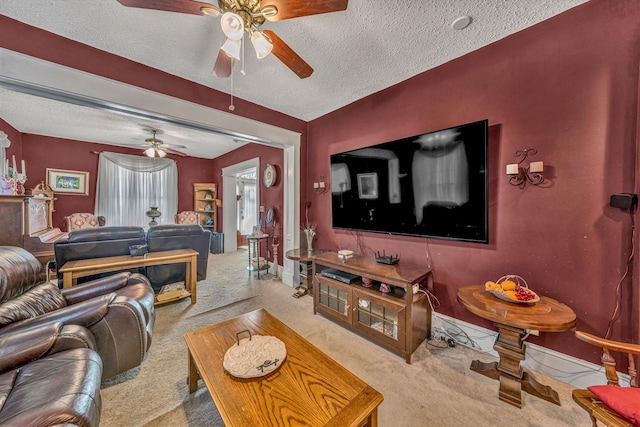 living room featuring a textured ceiling and carpet floors