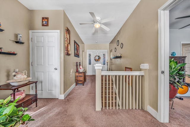 hall with carpet floors