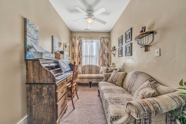 living room with light carpet and ceiling fan