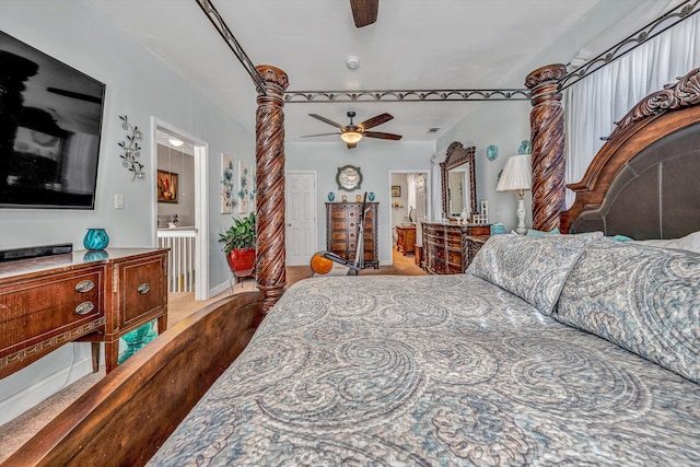 bedroom with ceiling fan and connected bathroom