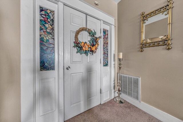 view of carpeted entryway