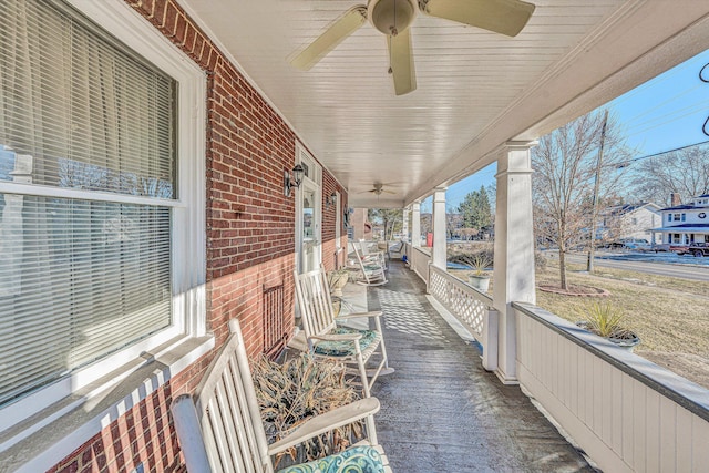 view of patio featuring covered porch and ceiling fan