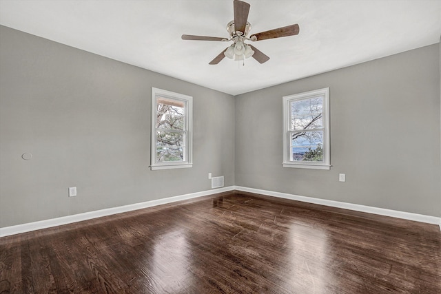 unfurnished room featuring hardwood / wood-style floors and ceiling fan