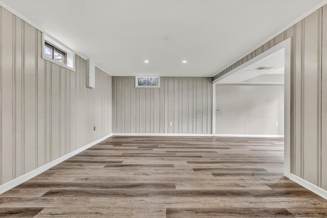 basement featuring wood-type flooring