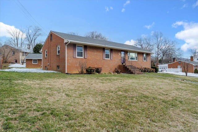 ranch-style home with a front yard