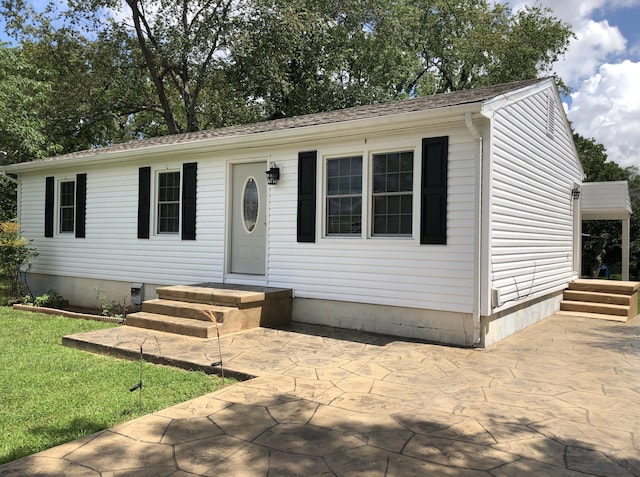 manufactured / mobile home featuring a patio