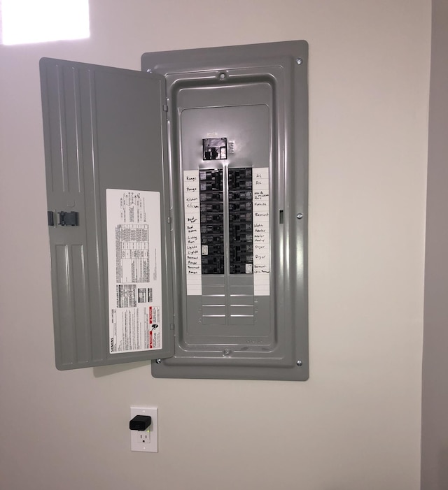 utility room featuring electric panel