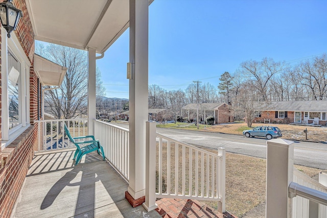 balcony featuring a porch