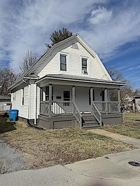 bungalow-style house featuring covered porch