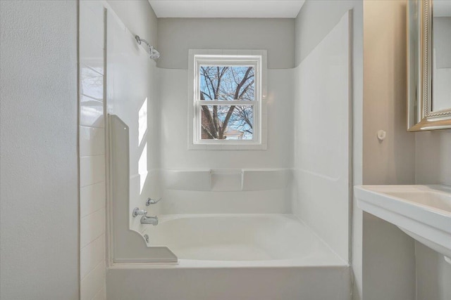 bathroom with bathtub / shower combination