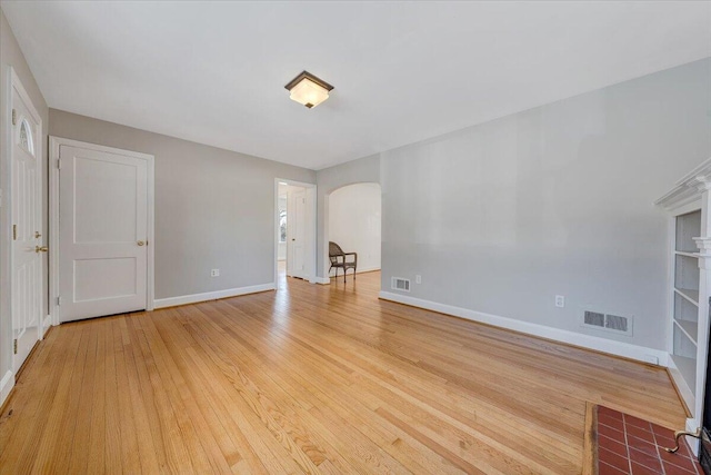 spare room with light wood-type flooring