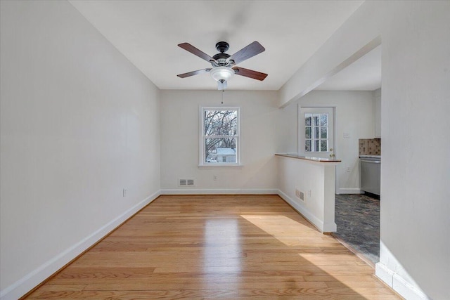 interior space featuring ceiling fan and light hardwood / wood-style floors