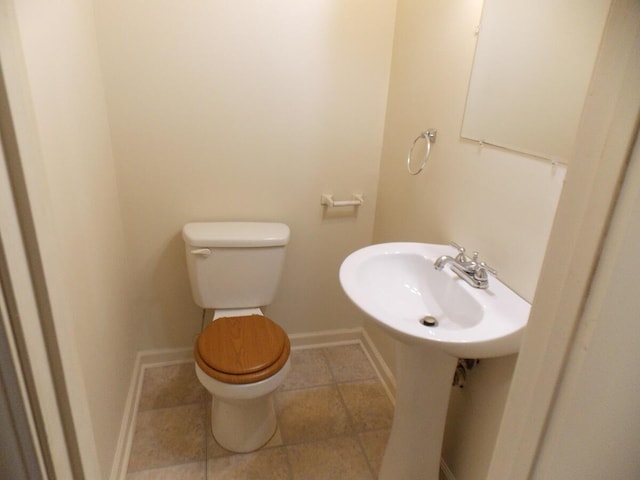 bathroom featuring toilet