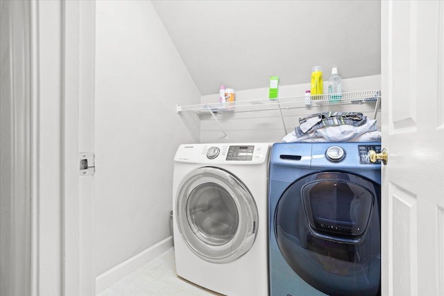 laundry room with independent washer and dryer