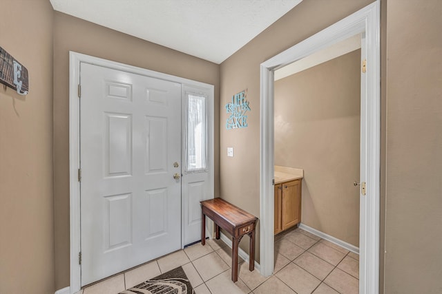 view of tiled foyer entrance