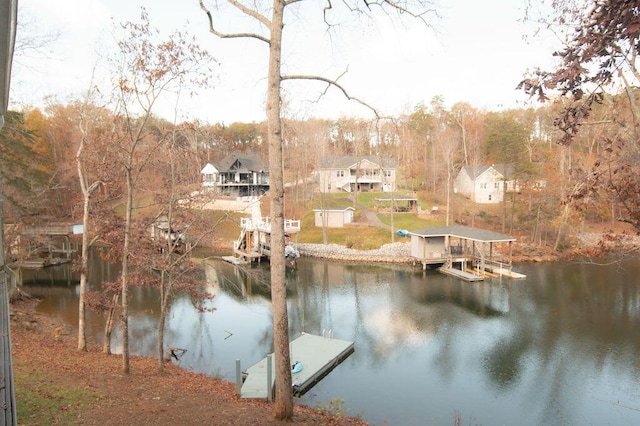 view of dock with a water view