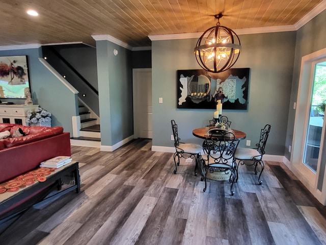 dining area with hardwood / wood-style floors, wood ceiling, crown molding, and an inviting chandelier