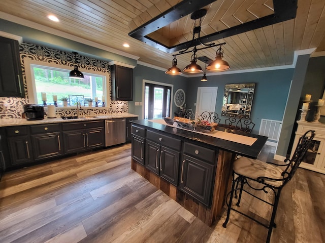 kitchen with dishwasher, a center island, wooden ceiling, a kitchen breakfast bar, and sink