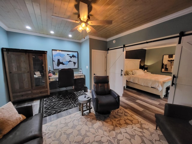 bedroom with wooden ceiling, crown molding, hardwood / wood-style flooring, ceiling fan, and a barn door