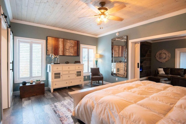 bedroom featuring ceiling fan, a barn door, dark hardwood / wood-style flooring, wood ceiling, and ornamental molding