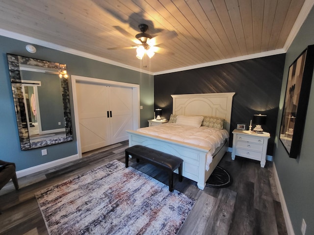 bedroom featuring ceiling fan, dark hardwood / wood-style flooring, ornamental molding, and wood ceiling