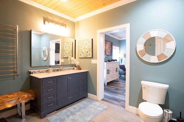 bathroom with radiator heating unit, vanity, wood ceiling, and ornamental molding