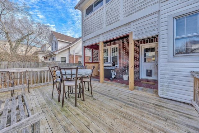 wooden terrace with grilling area