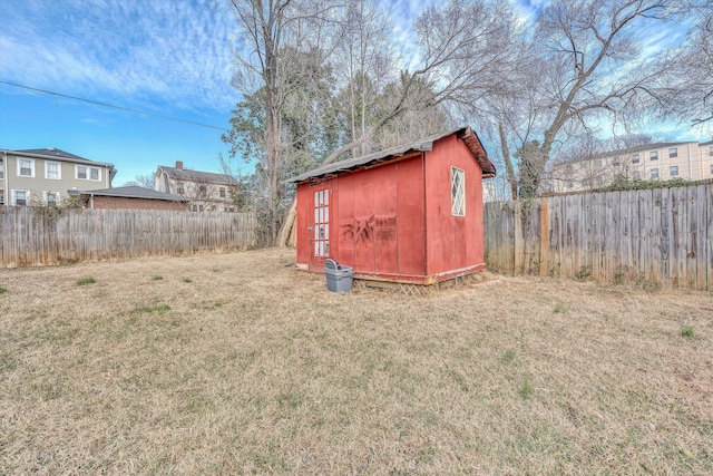 view of outdoor structure with a yard