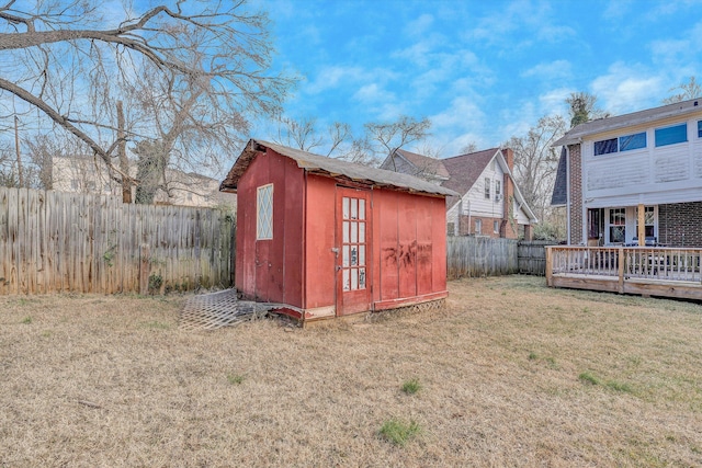 view of outdoor structure featuring a lawn