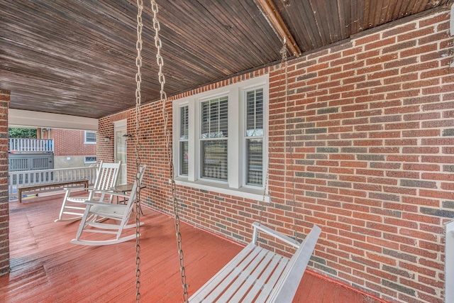 wooden deck with covered porch