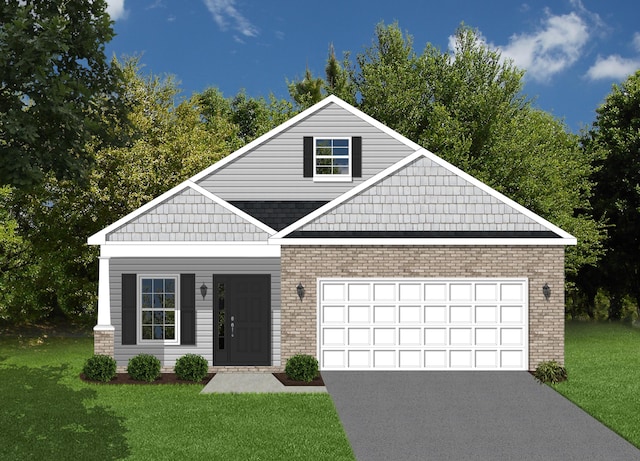 view of front of property featuring a garage and a front yard