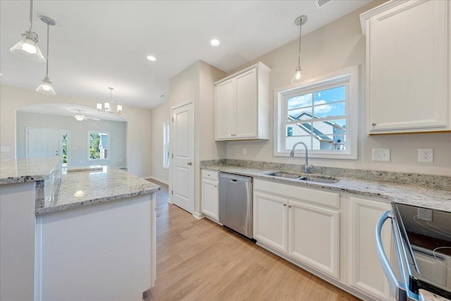 kitchen with stainless steel dishwasher, ceiling fan, sink, white cabinetry, and hanging light fixtures