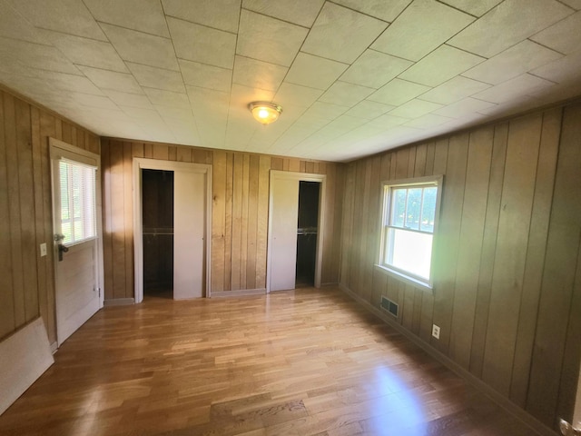 unfurnished bedroom with light hardwood / wood-style flooring