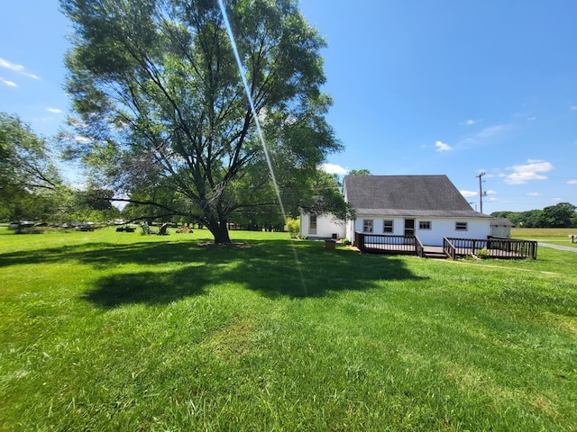 view of yard with a deck