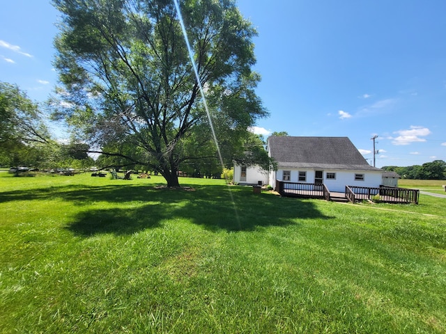 view of yard with a deck