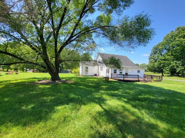 view of yard with a deck