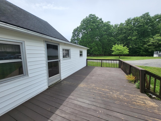 deck featuring a lawn