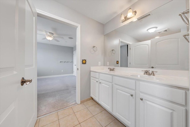 bathroom featuring ceiling fan, tile patterned floors, and vanity