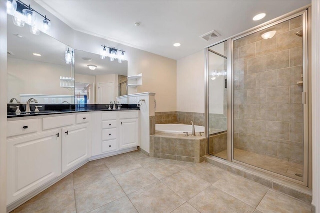 bathroom with separate shower and tub, tile patterned flooring, and vanity