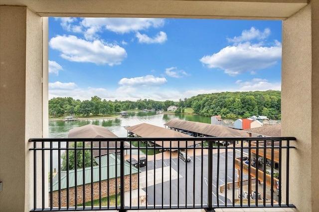 balcony featuring a water view