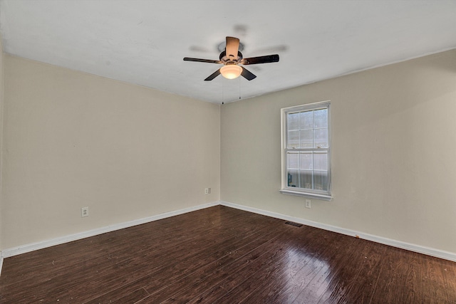 spare room featuring ceiling fan and hardwood / wood-style flooring