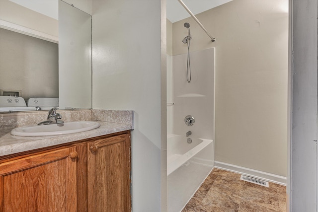 bathroom featuring vanity and shower / washtub combination